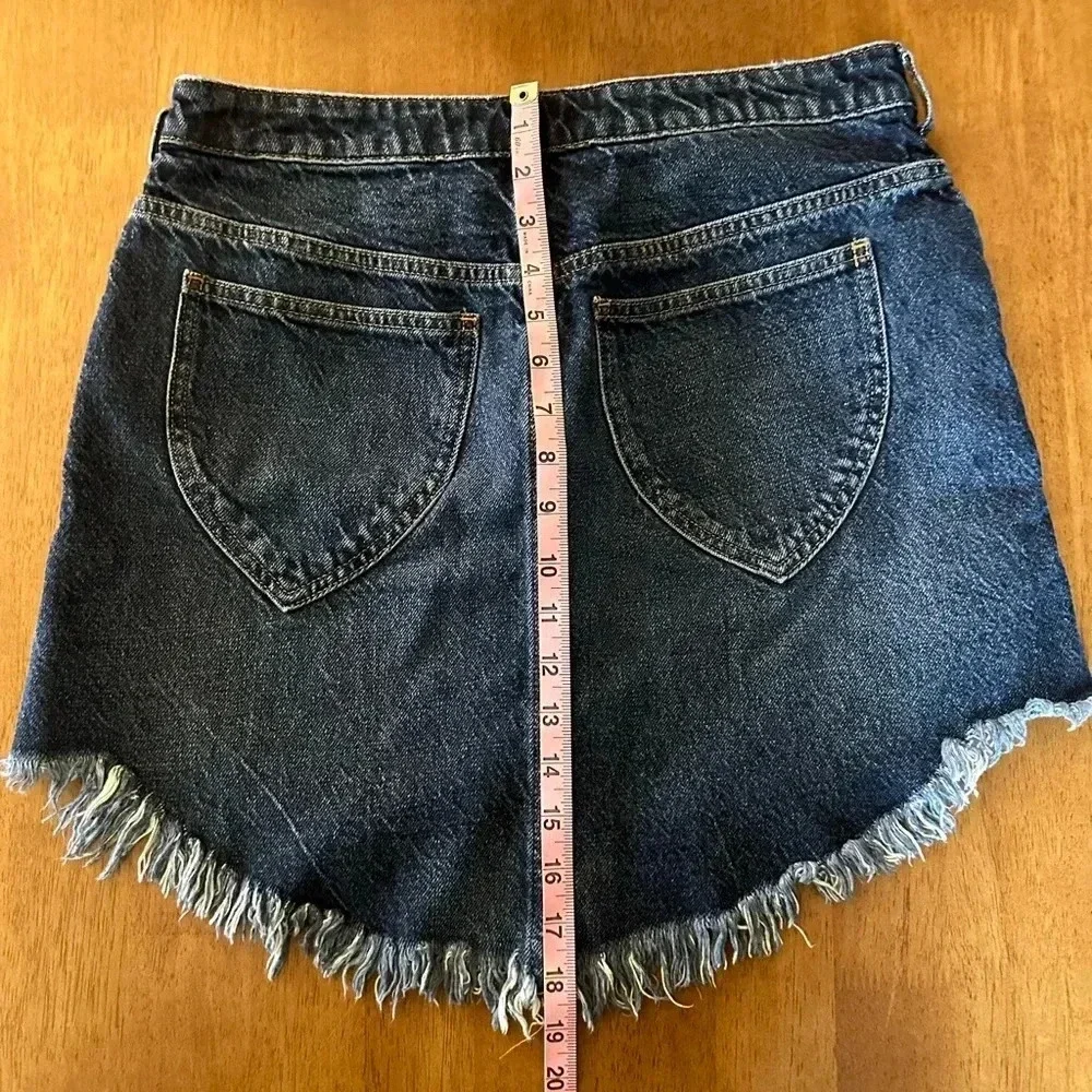 Free People We The Free Bailey Fringe Denim Mini Skirt. - Picture 9 of 10